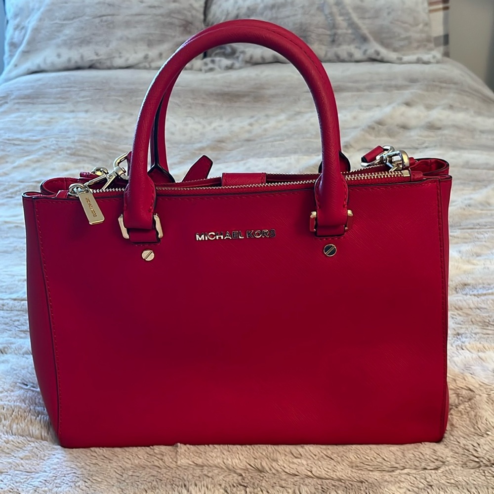Red Michael Kors handbag